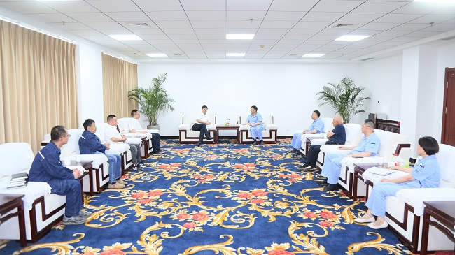 中電建河南工程有限公司黨委書記、董事長劉長龍一行到萬基控股集團交流訪談